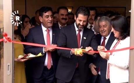 KRG deputy PM Qubad Talabani (C) and investor Faruk Mustafa (2nd L) cut a ribbon to mark the start of the massive tourism project on Lake Dukan, July 29. Photo: Rudaw video