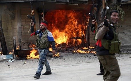 Syrian rebels looting Afrin city, March 19, 2018. Photo: AFP