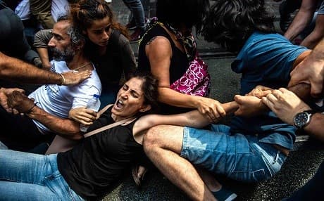 Istanbul police break up a regular demonstration by Turkish mothers remembering the disappearance of relatives in the 1980s and 1990s, detaining dozens as they marked holding the 700th such weekly protest. / AFP / Yasin AKGUL