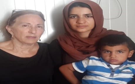 Amy Beam (left), a US author and Yezidi activist, has assisted hundreds with application for asylum. Photo: Amy Beam