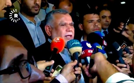 Hadi al-Amiri, leader of the Fathi alliance, speaks to reporters at the Iraqi parliament, Baghdad, September 3, 2018. Photo: Rudaw video
