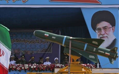 The Iranian military parades missiles past a portrait of Ayatollah Ali Khamenei during a ceremony for the country's annual army day in April in Tehran. Photo: Atta Kenare/AFP