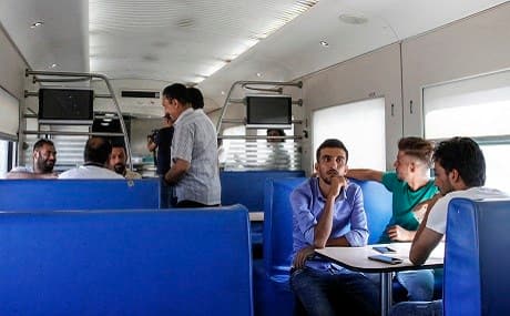 Iraqi passengers sit in a cabin on a train from the capital Baghdad to the city of Fallujah in Anbar province, about 70 kilometres west, August 19, 2018. Photo: Sabah Arar