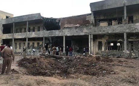 PDKI members inspect the damage to their Koya headquarters by Iranian missile strikes. Photo: Rudaw