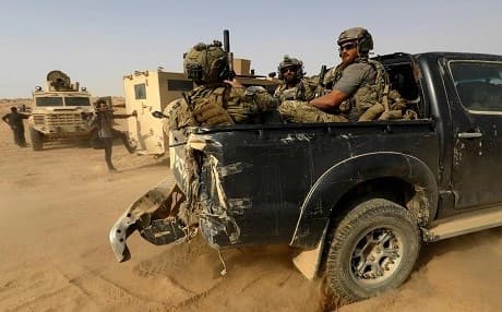 US-backed forces are pictured near the village of Susah in the eastern province of Deir Ezzor, near the Syrian border with Iraq on September 13, 2018. Photo: Delil Souleiman | AFP
