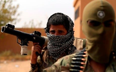 Members of the SDF gather in the village of al-Susah, Deir ez-Zor on September 13, 2018. Photo: Delil Souleiman/AFP