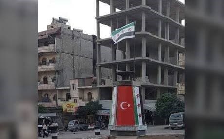 Syrian opposition and Turkish flags adorn what was a Kurdish Newroz monument in Afrin. Photo: Supplied