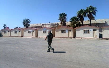 In this photo released by the Syrian official news agency SANA, a Syrian soldier walks inside the Naseeb crossing point with Jordan, Syria, Sept 29, 2018. Photo: SANA via AP