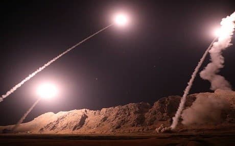 This handout photo provided by Iran's Revolutionary Guard official website shows missiles being launched from an undisclosed location to target militants in eastern Syria early on October 1, 2018. Photo: IRGC via AFP
