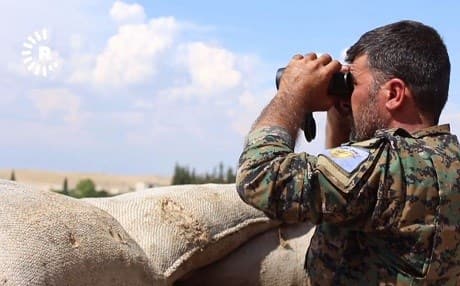 A member of the Manbij Military Council keeps watch at an observation point near the city. File photo: Rudaw