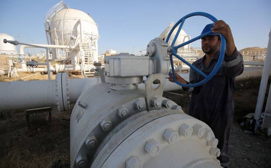 A worker checks pipelines at Kirkuk's Bai Hassan oil field. File photo: AFP