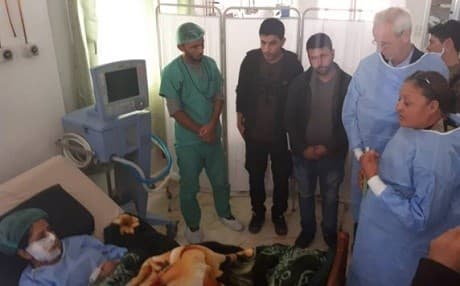 US Ambassador William Roebuck (R) visits ANHA journalist Gulistan Mohammed in hospital in Manbij. Photo: Manbij Military Council