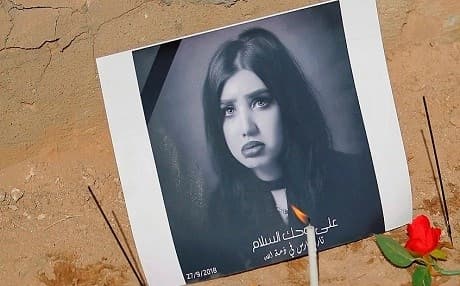 Fans of 22-year-old Tara Fares leave flowers and candles over her grave in Iraq. File photo: AP
