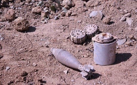 Mines and UXO retrieved in Penjwin, Sulaimani province, before a controlled demolition, June 2018. Photo: Robert Edwards / Rudaw