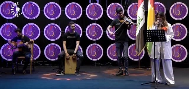 Kurdish artist and humanitarian Dashni Morad sings at the launch of the National Campaign to Combat Violence Against Women in the Kurdistan Region in Erbil on November 25, 2018. Photo: Rudaw TV