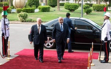 Iraqi Prime Minister Adil Abdul Mahdi (R) and his predecessor Haider al-Abadi pictured during the handover of power in October. Photo: PM office/handout 