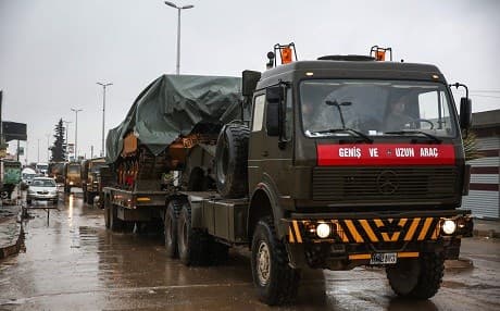 A column of Turkish tanks and military trucks is seen on the road to al-Rai, northern Syria on December 26, 2018. Photo: Nazeer al-Khatib/AFP