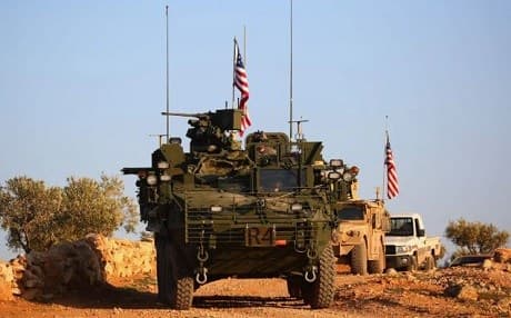 US vehicles patrol near the village of Yalanli, on the western outskirts of the northern Syrian city of Manbij. Photo: AFP/Delil Souleiman