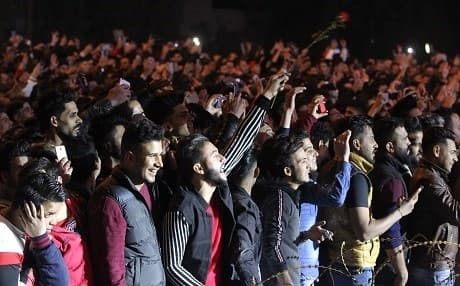 Iraqis watched fireworks above Baghdad Tower during New Year celebrations in the capital. Photo: Ahmad al-Rubaye/AFP