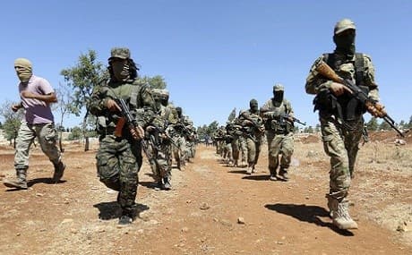 Hay'at Tahrir al-Sham militants on drill in Idlib. File Photo: AFP 