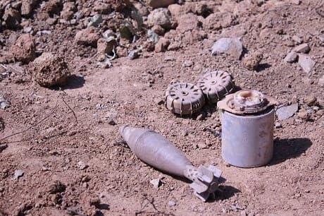 Legacy mines and explosives retrieved in Penjwin, pictured before a controlled demolition. Photo: Robert Edwards/Rudaw