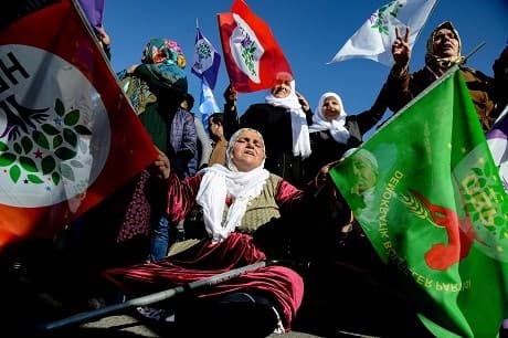 Protesters hold HDP flags during a rally in Diyarbakir in support of Leyla Guven on January 19, 2019. Photos: AFP