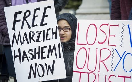 Amnesty criticizes Iran's mass arrests as US frees reporter