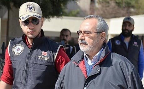 Hamza Ulucay (R) was arrested in 2017 on alleged ties to the PKK and the Gulen movement. File photo: Anadolu Agency