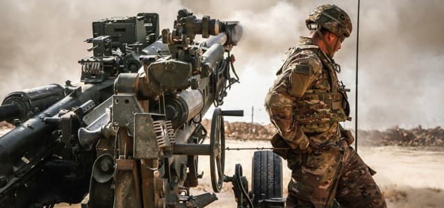 A 101st Airborne Division soldier pulls the lanyard on an M777A2 howitzer during a fire mission near the Iraq-Syria border on January 26, 2019. Photo: SPC. Gyasi Thomasson | US Army