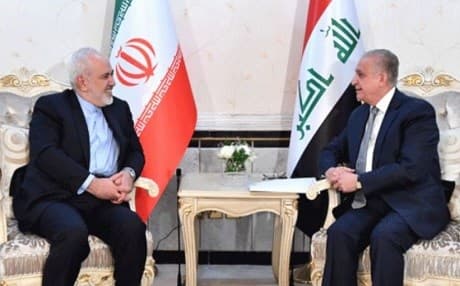 The foreign ministers of Iran, Mohammed Javad Zarif (L), and Iraq, Mohamed Ali al-Hakim (R), met in Baghdad on March 10, 2019, a day ahead of President Hassan Rouhani’s arrival. Photo: Iraqi state media