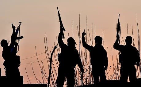 US-backed Syrian Democratic Forces (SDF) fighters celebrate after fighting Islamic State (IS) group jihadists near the village of Baghouz, eastern Syria, March 15, 2019. Photo: Giuseppe Cacace / AFP 