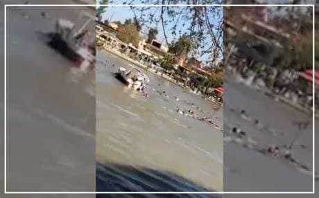 A crowded ferry sunk in the Tigris River in Mosul on Thursday afternoon. Photo: Mosul Eye video