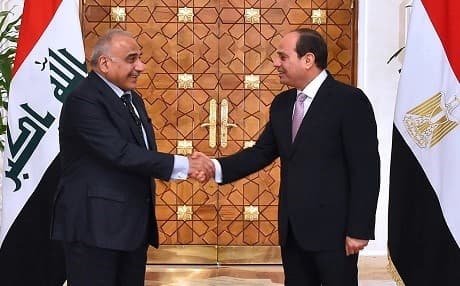 Prime Minister Adil Abdul-Mahdi, on his first trip abroad as PM, shakes hands with Egyptian President Abdel Fattah el-Sisis in Cairo on March 23, 2019. Photo: handout/Egyptian presidency/AFP