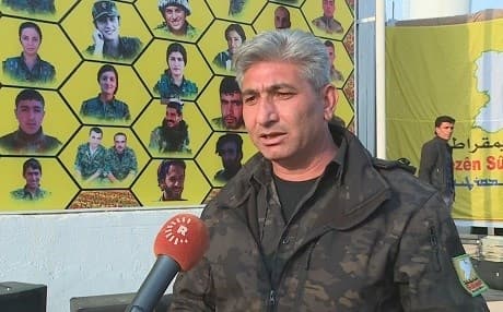 Redur Khalil, SDF spokesperson and senior official, answers questions on the sidelines of a ceremony in al-Omar oil field, Deir ez-Zor to mark the defeat of the Islamic State caliphate. Photo: Rudaw