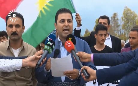 Spokespeople protesting Arabization policies read a statement at a demonstration in Palkana village, Kirkuk province, on April 19, 2019. Photo: Rudaw video