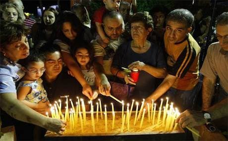 Armenians hold a candle light ceremony in Lebanon. Photo: AFP