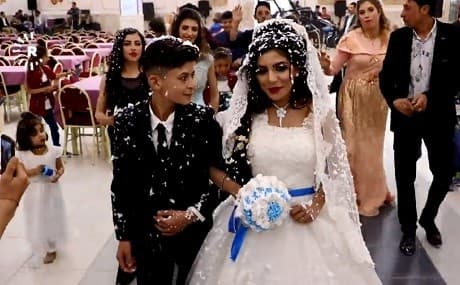 Displaced Yezidi children Aymen, 14, and his bride Ahlam, 17, during their marriage ceremony in Duhok province, April 17, 2019. Photo: Rudaw TV