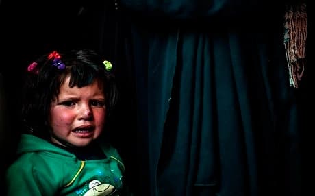 A Syrian girl cries as she waits to receive treatment for leishmaniasis at a health centre in al-Karamah, in northern Syria, about 26 kilometres east of Raqqa, on April 16, 2019. Photos: Delil Souleiman | AFP