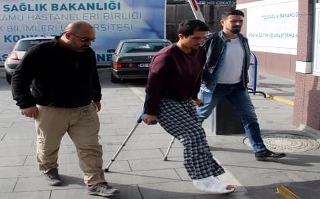 Turkish security in Konya escort a man accused of having ties to the 2016 failed military coup on April 26, 2019. Photo: AA
