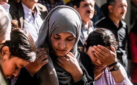 Yazidi women and children rescued from ISIS in Syria wait to board buses bound for Shingal, April 13, 2019. File photo: Delil Souleiman / AFP 