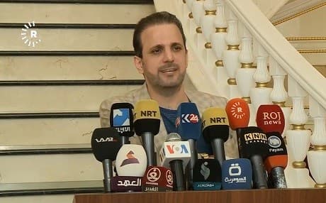 Shaswar Abdulwahid, leader of the New Generation, speaks during a press conference at his office in Sulaimani on May 1, 2019. 