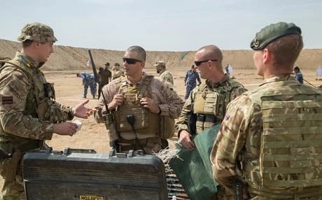 British soldiers and US Marines conduct an after action review as part of their coalition mission at al-Taqaddum, Iraq on April 11, 2019. Photo: Pfc. Zachary Myers/US Army 