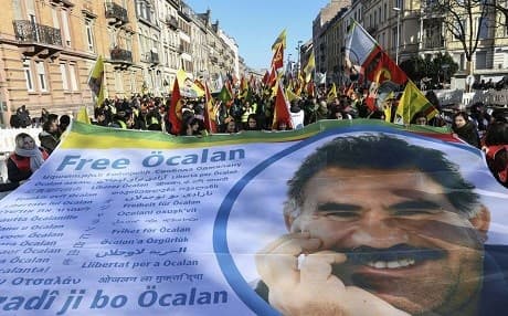 Supporters carry a “Free Ocalan” banner during a demonstration in Strasbourg, France on February 16, 2019. Photo: Sebastien Bozon/AFP