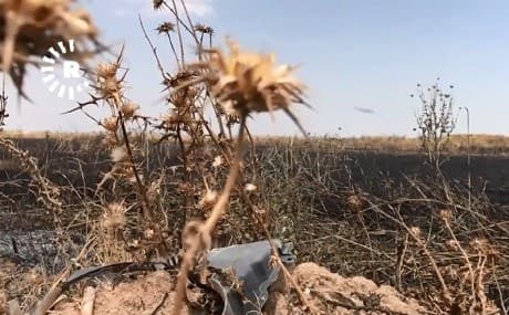 A crop field on the outskirts of the disputed town of Khanaqin is blackened after suspected militants torched the land. Photo: Rudaw TV