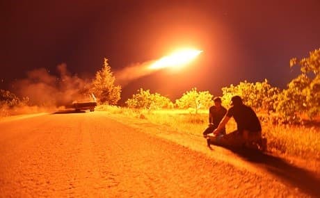 Fighters from Hayat Tahrir al-Sham (HTS), Syria’s former al-Qaeda affiliate, fire a missile against regime positions, May 13, 2019. Photo: Omar Haj Jadour / AFP