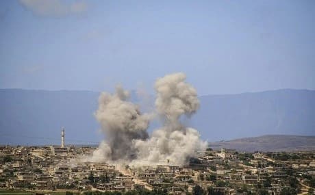Smoke rising after Syrian government and Russian airstrikes hit the town of al-Habeet, southern Idlib, Syria, May 3, 2019. File photo: White Helmets / AP