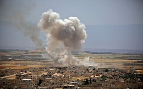 Plumes of smoke rise following reported Syrian government forces' bombardment on the town of Khan Sheikhun in the southern countryside of the jihadist-held Idlib province, on June 6, 2019. Photo: Anas al-Dyab | AFP