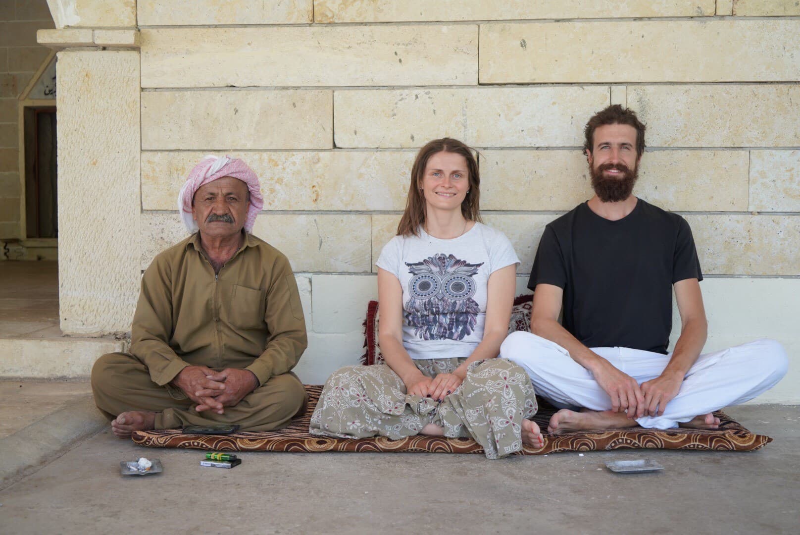 The authors in Lalish with a priest. Photo: from the authors