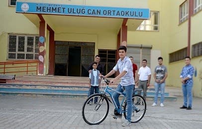 Mohammed Khalil in front of his school in Kilis, south-central Turkey. Photo: AA