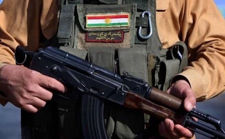 A Peshmerga fighter takes position in August 2014. Photo: AFP/ Safin Hamed